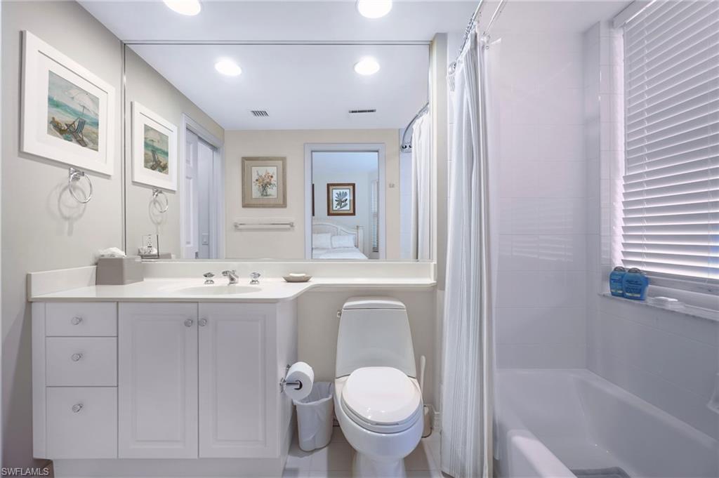 435 Dockside Drive, Unit B803 Naples, FL 34110 - Photo 28 of 35 Full bathroom featuring vanity, shower / bath combo, and toilet