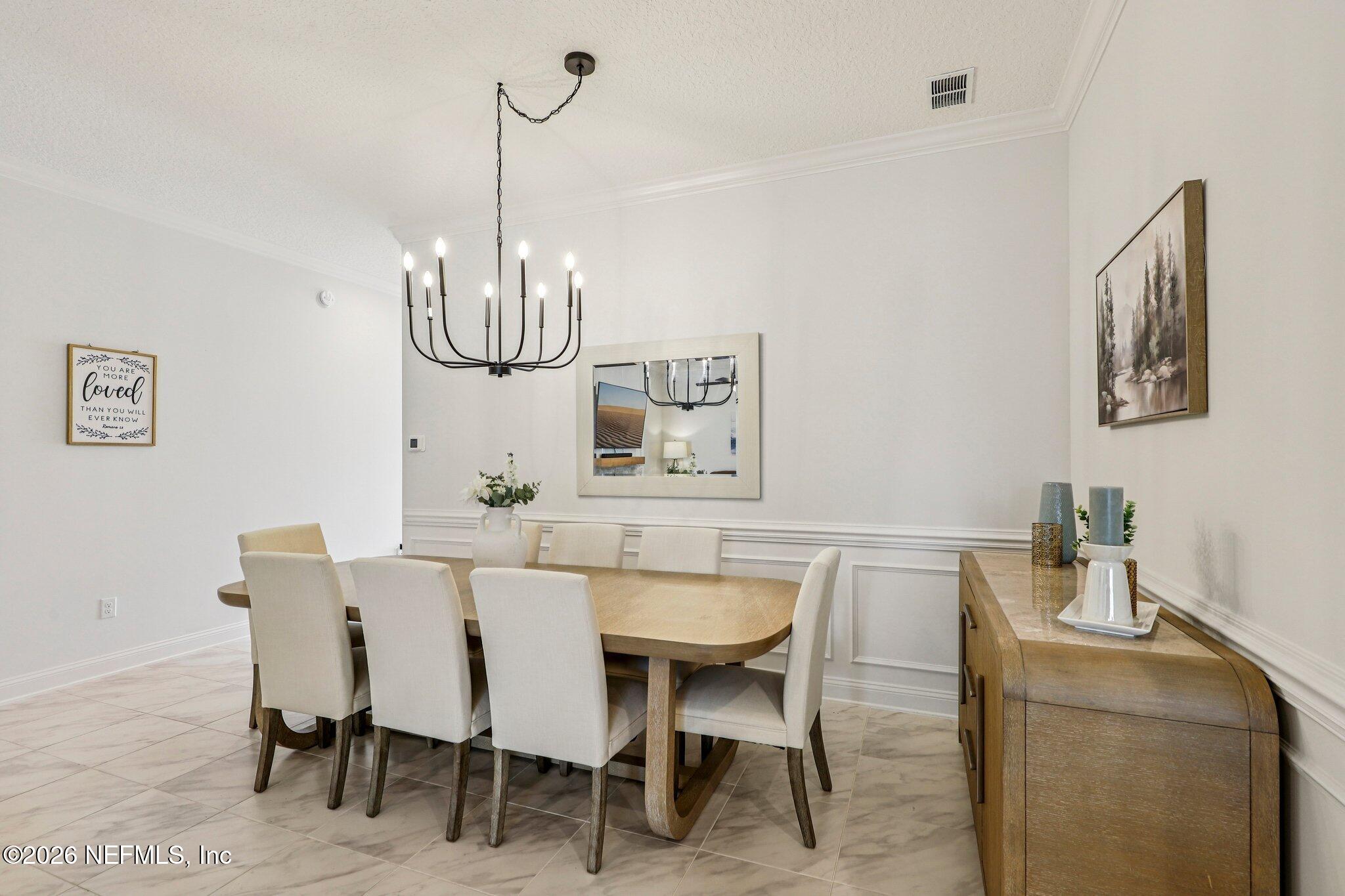 84 Firecrest Drive St. Augustine, FL 32092 - Photo 18 of 72 a view of a dining room with furniture