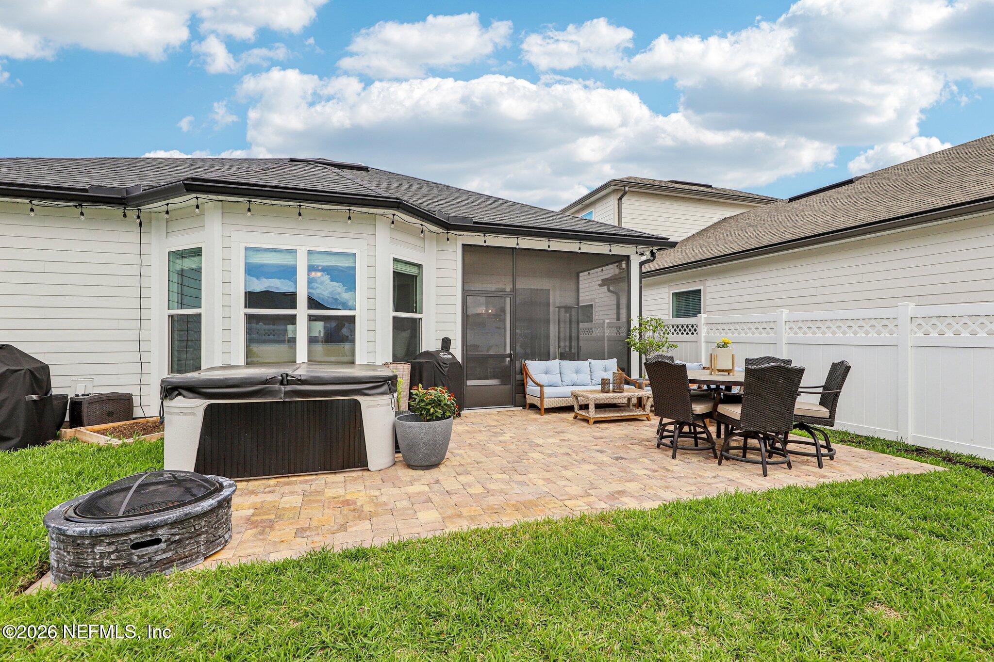 84 Firecrest Drive St. Augustine, FL 32092 - Photo 44 of 72 a front view of a house with patio