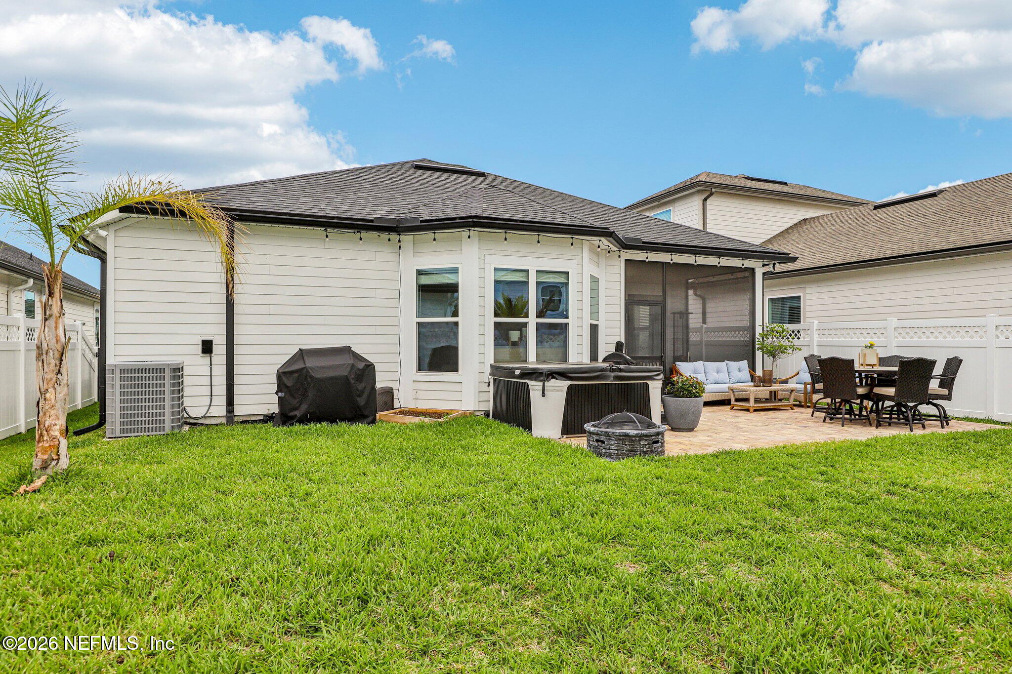 84 Firecrest Drive St. Augustine, FL 32092 - Photo 49 of 72 a view of a house with backyard porch and sitting area