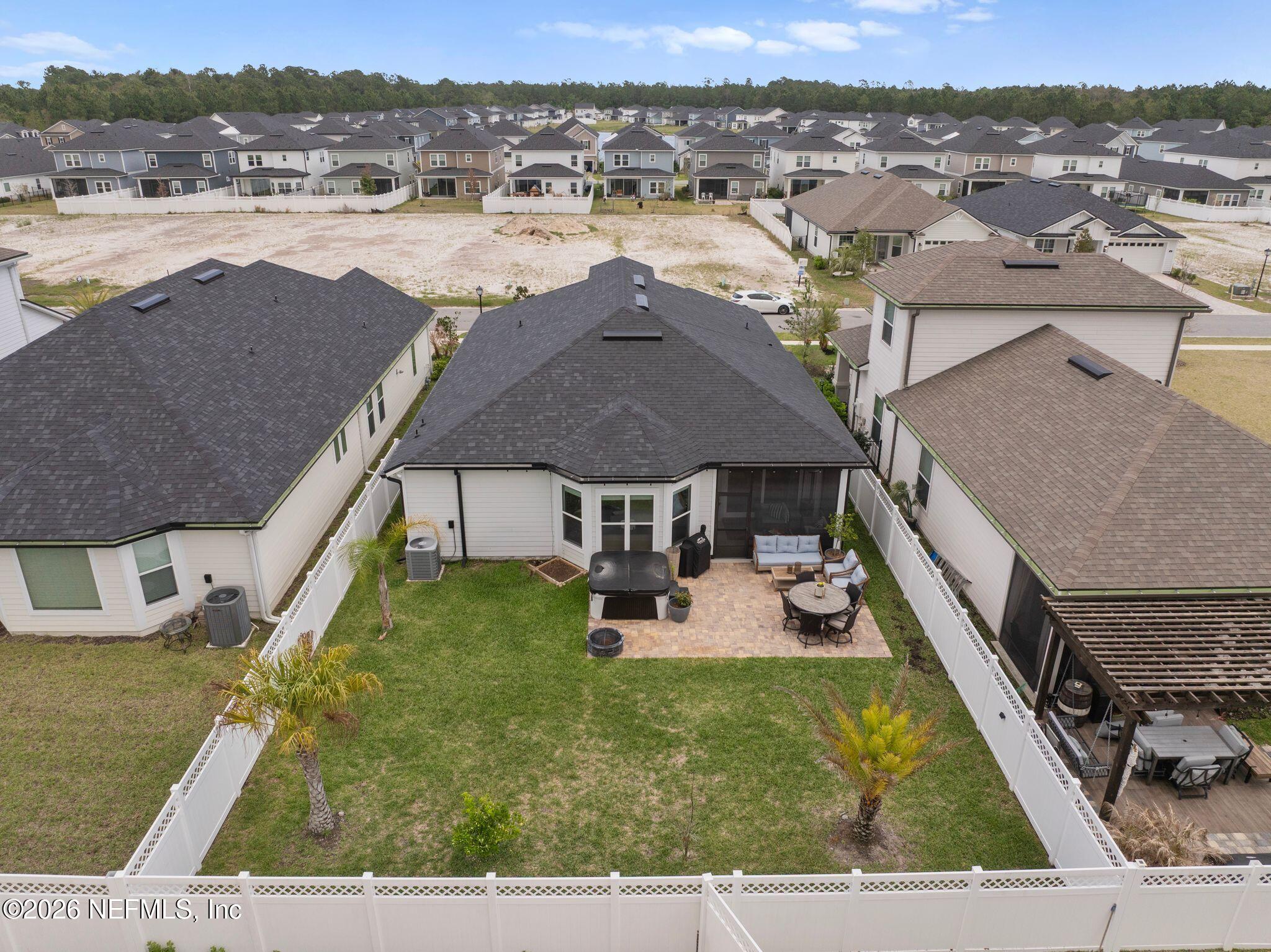 84 Firecrest Drive St. Augustine, FL 32092 - Photo 56 of 72 an aerial view of residential houses with outdoor space and city view