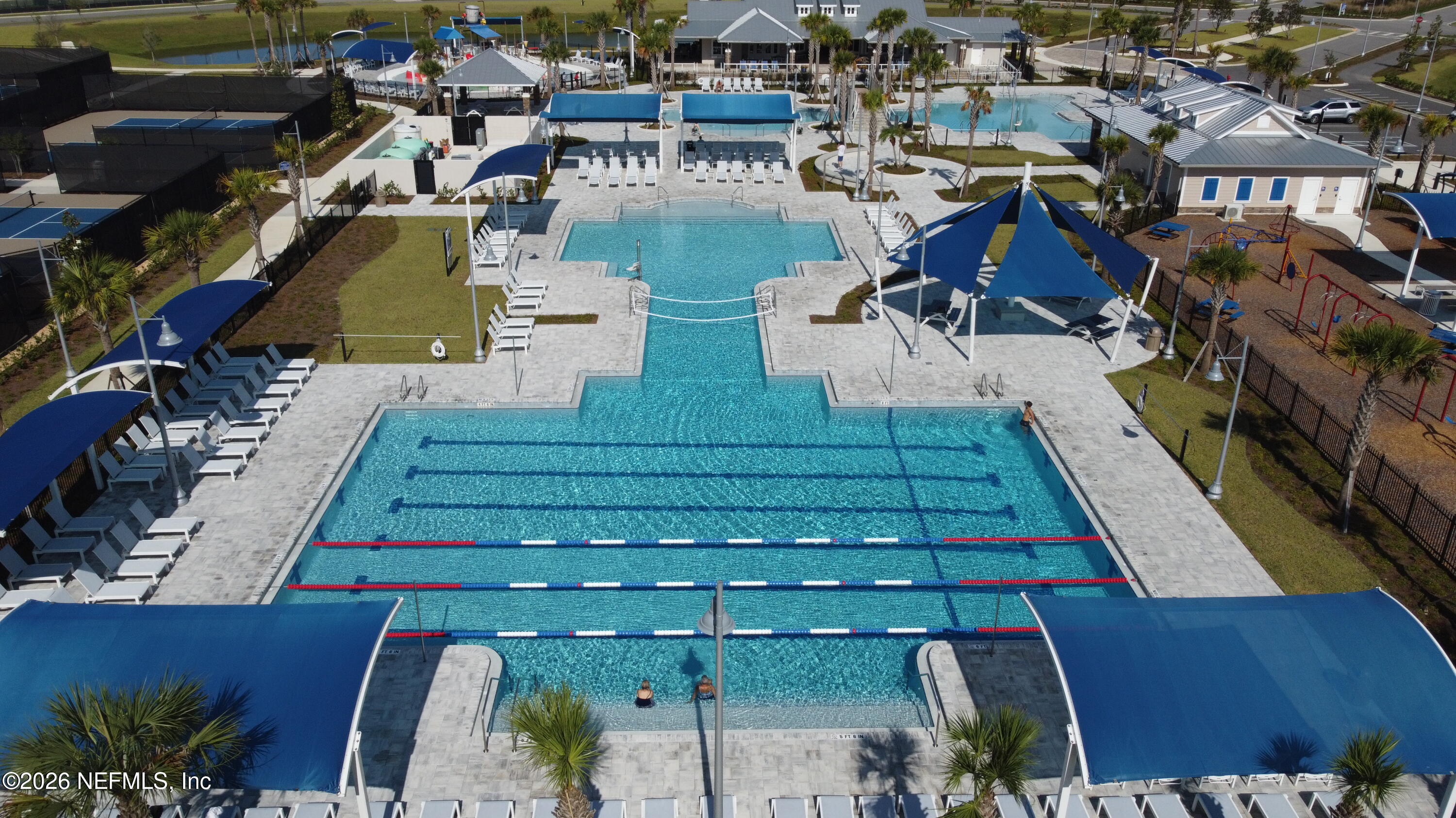 84 Firecrest Drive St. Augustine, FL 32092 - Photo 64 of 72 a view of a swimming pool with outdoor seating