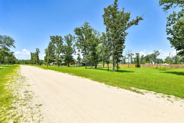 an aerial view of house with yard