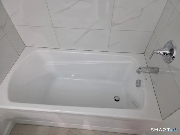 a bathroom with a bathtub