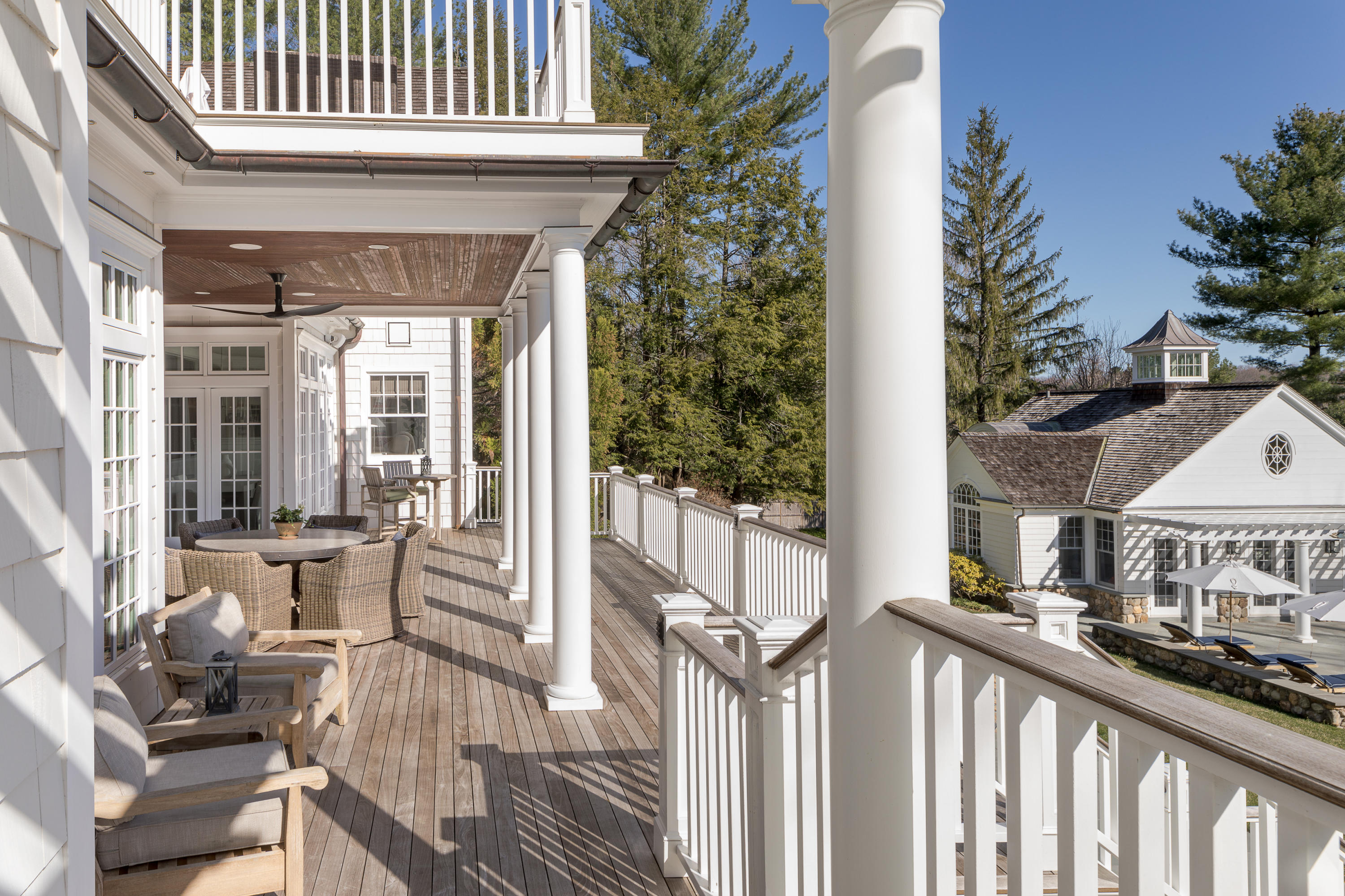 289 Oenoke Ridge New Canaan, CT 06840 - Photo 12 of 39 a view of a house with wooden floor and wooden fence