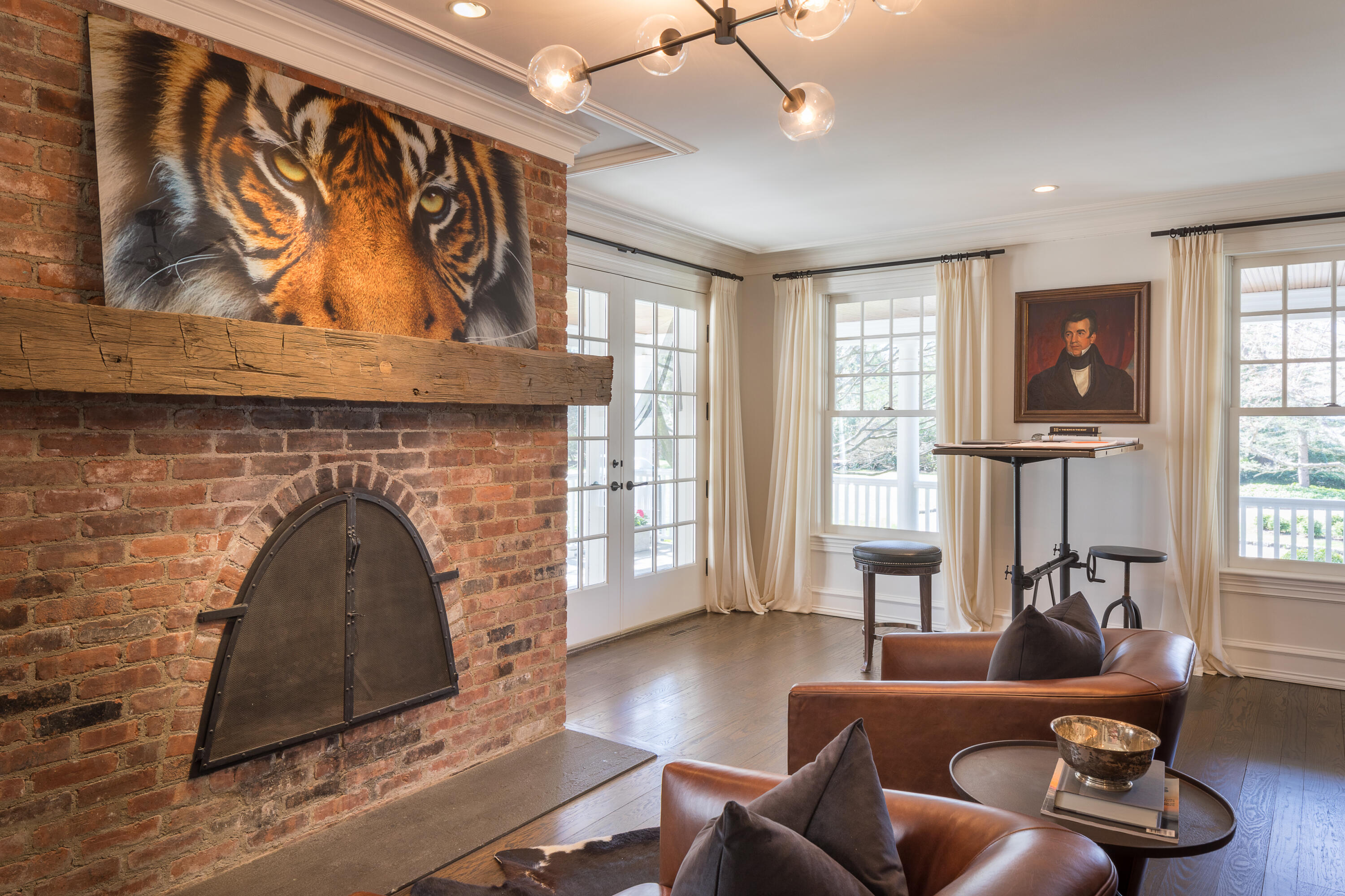 289 Oenoke Ridge New Canaan, CT 06840 - Photo 14 of 39 a living room with furniture and a fireplace