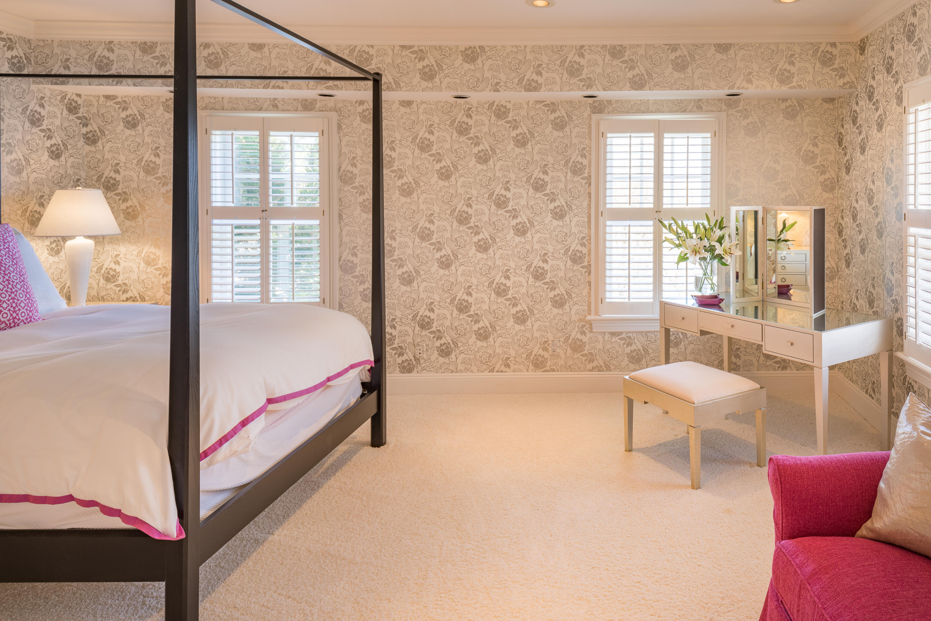 289 Oenoke Ridge New Canaan, CT 06840 - Photo 23 of 39 a bedroom with a bed and wooden floor