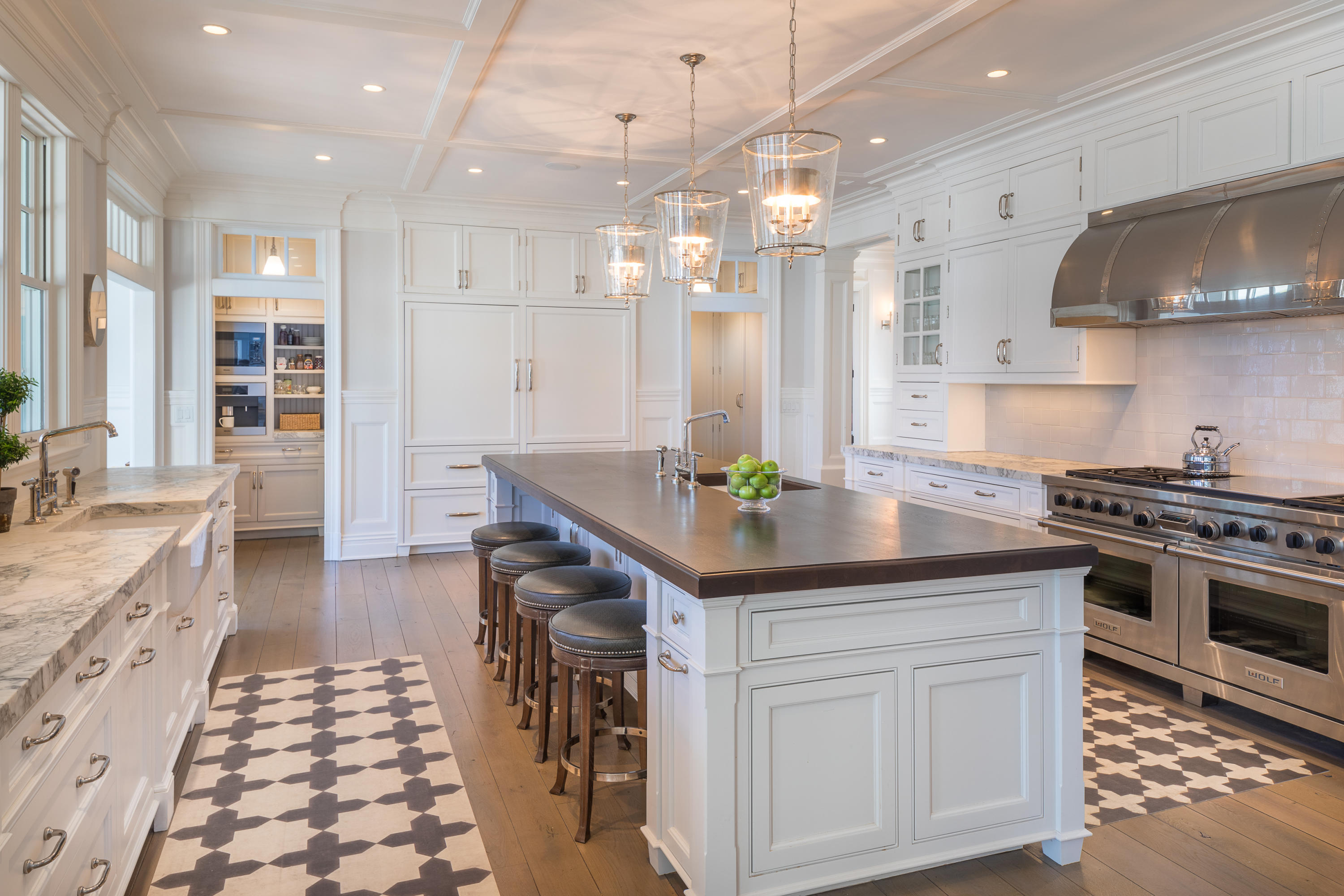289 Oenoke Ridge New Canaan, CT 06840 - Photo 5 of 39 a kitchen with stainless steel appliances kitchen island granite countertop a sink and a stove