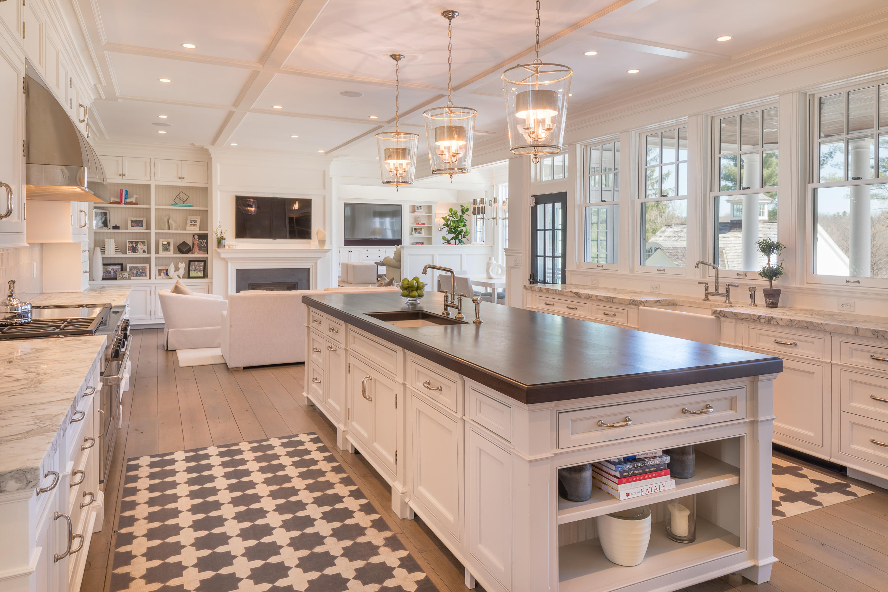 289 Oenoke Ridge New Canaan, CT 06840 - Photo 7 of 39 a kitchen with kitchen island granite countertop a sink and a stove