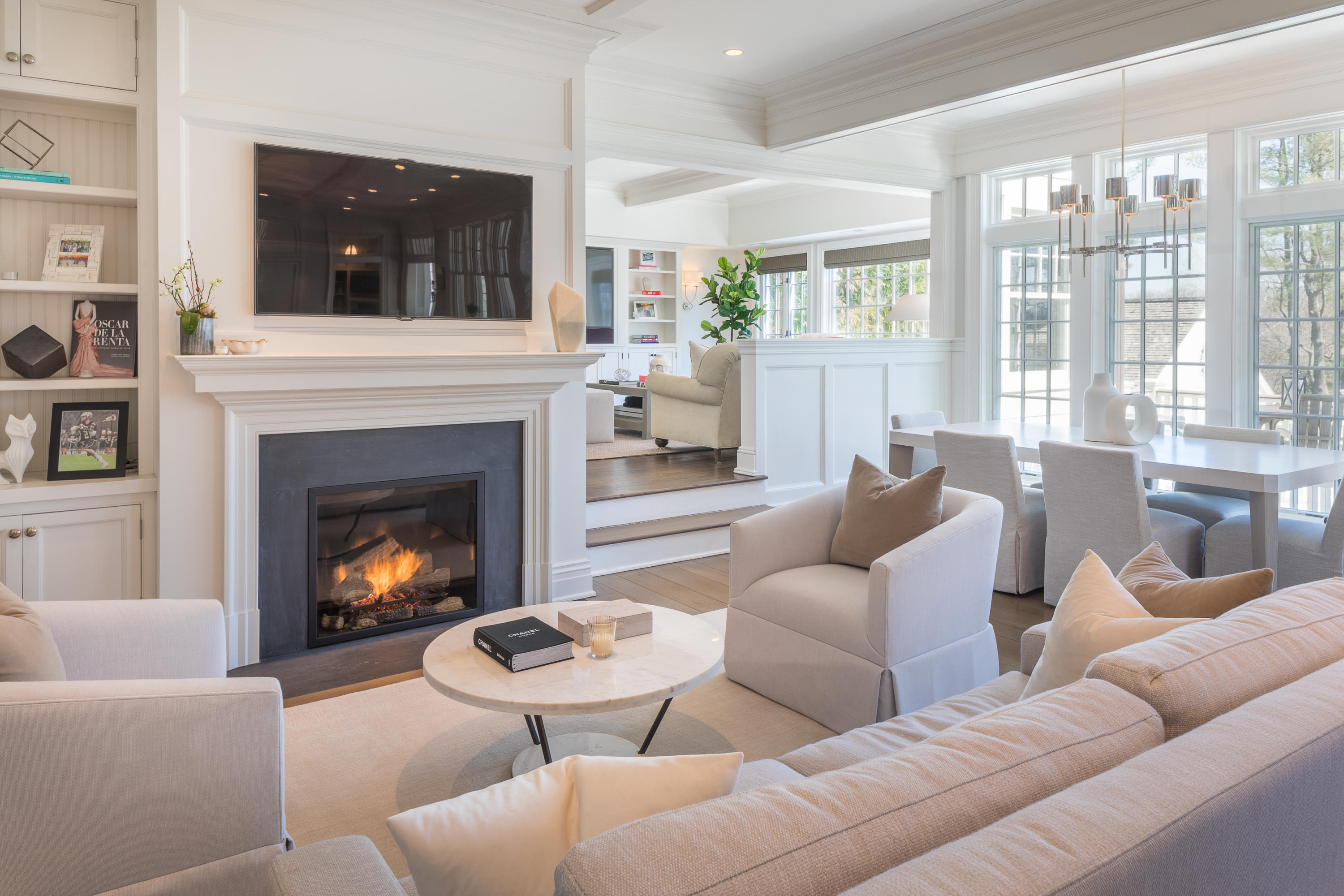 289 Oenoke Ridge New Canaan, CT 06840 - Photo 8 of 39 a living room with furniture and a fireplace