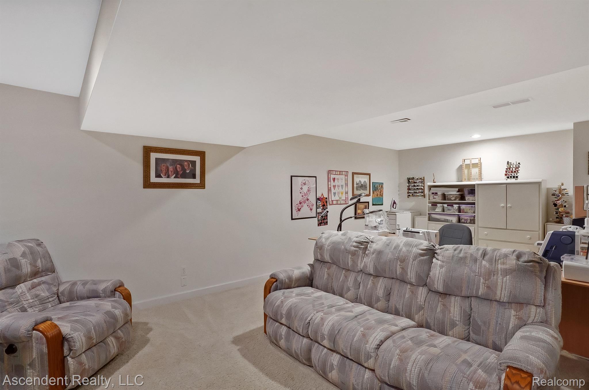 3704 Tremonte Circle, Unit 88 Rochester, MI 48306 - Photo 32 of 41 Lower level rec area view 3