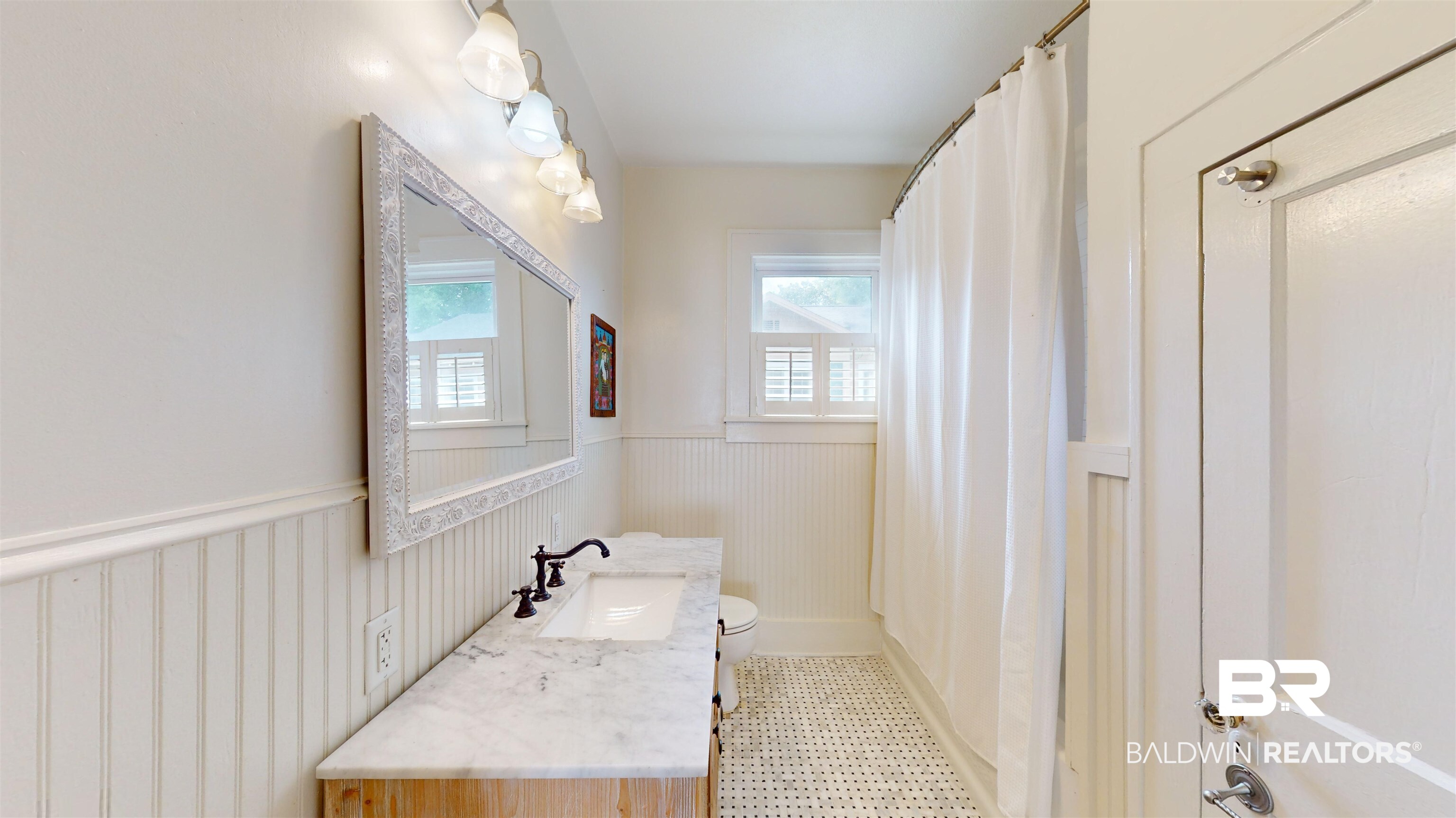 4307 Stein Street Mobile, AL 36608 - Photo 16 of 28 Bathroom featuring vanity, tile patterned flooring, and toilet