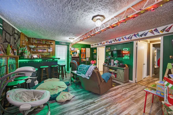 a view of a chairs and table in a patio