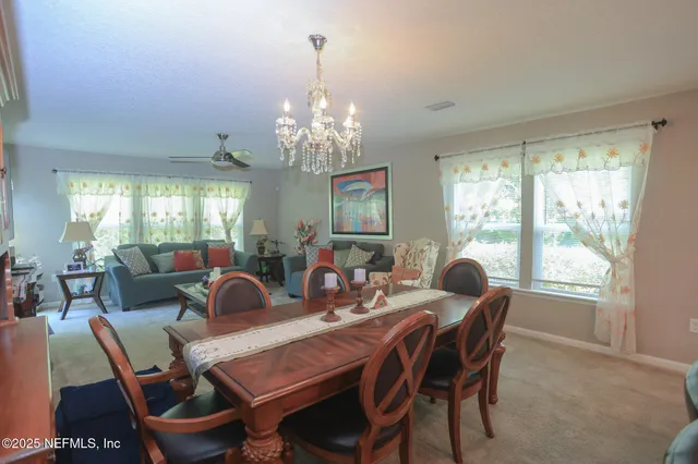 a bathroom with a sink mirror and vanity