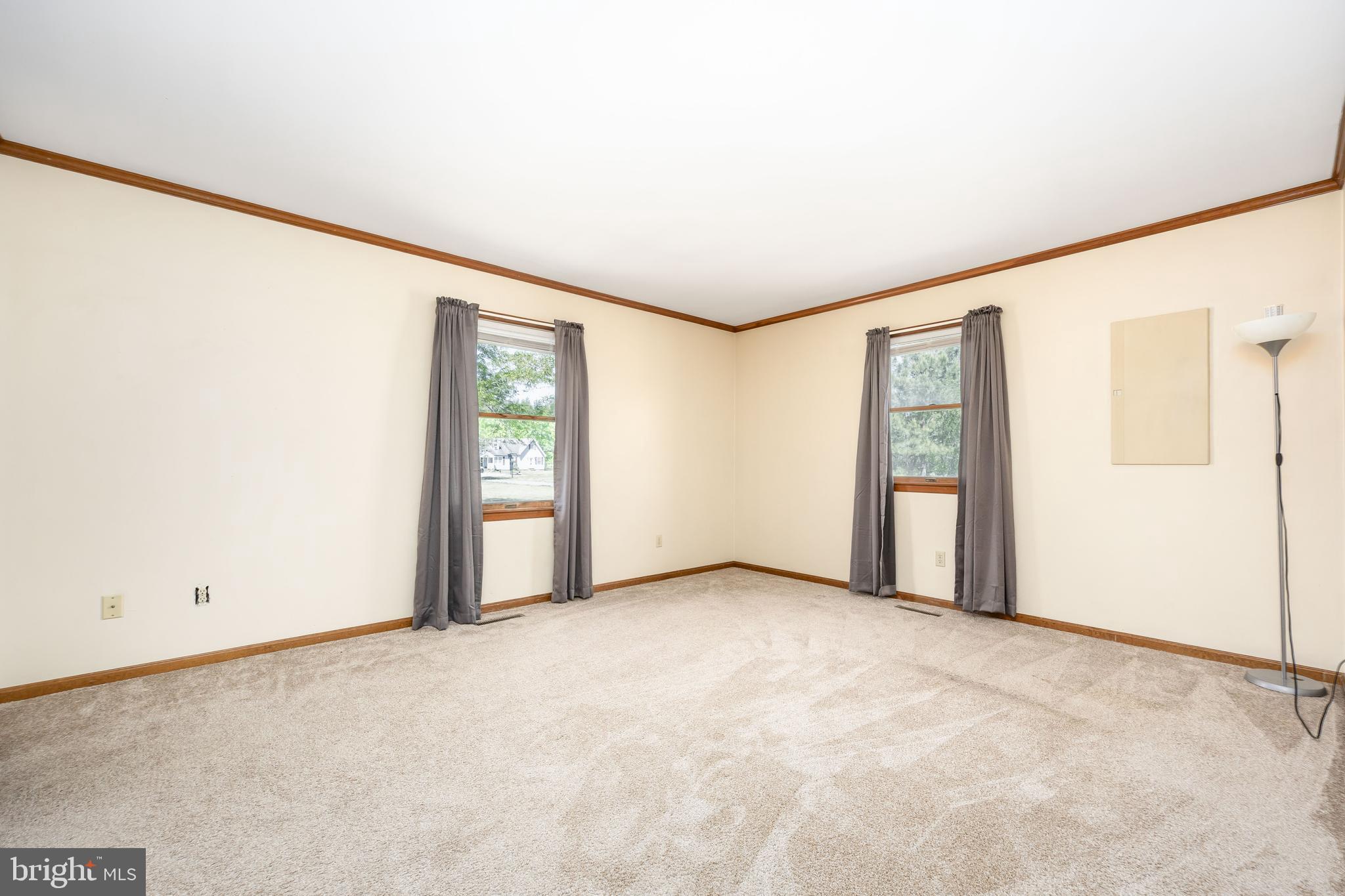 9830 Sharptown Road Mardela Springs, MD 21837 - Photo 34 of 51 an empty room with windows