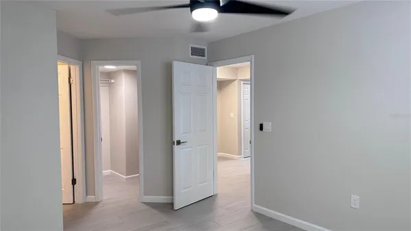 a view of an empty room and window