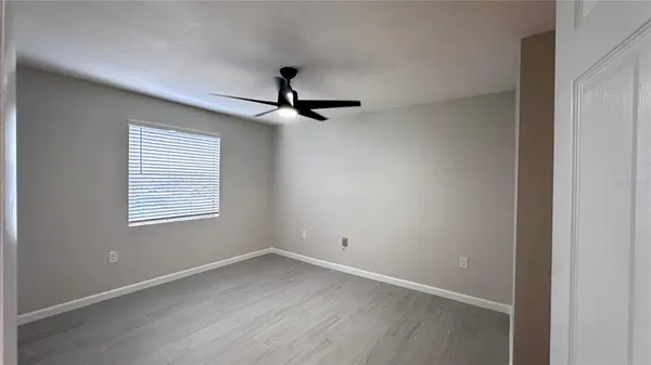 a view of a room that has a window in it