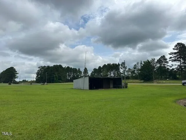 a view of a golf course with a garden