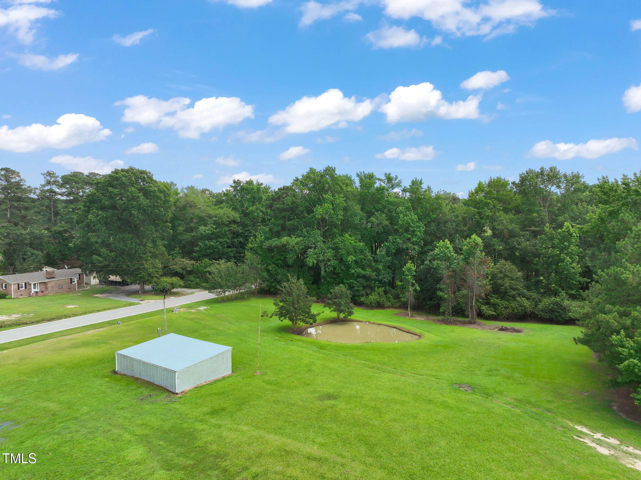 Lot 2 Raleigh Road Four Oaks, NC 27524 - Photo 4 of 12 a view of a golf course with a swimming pool