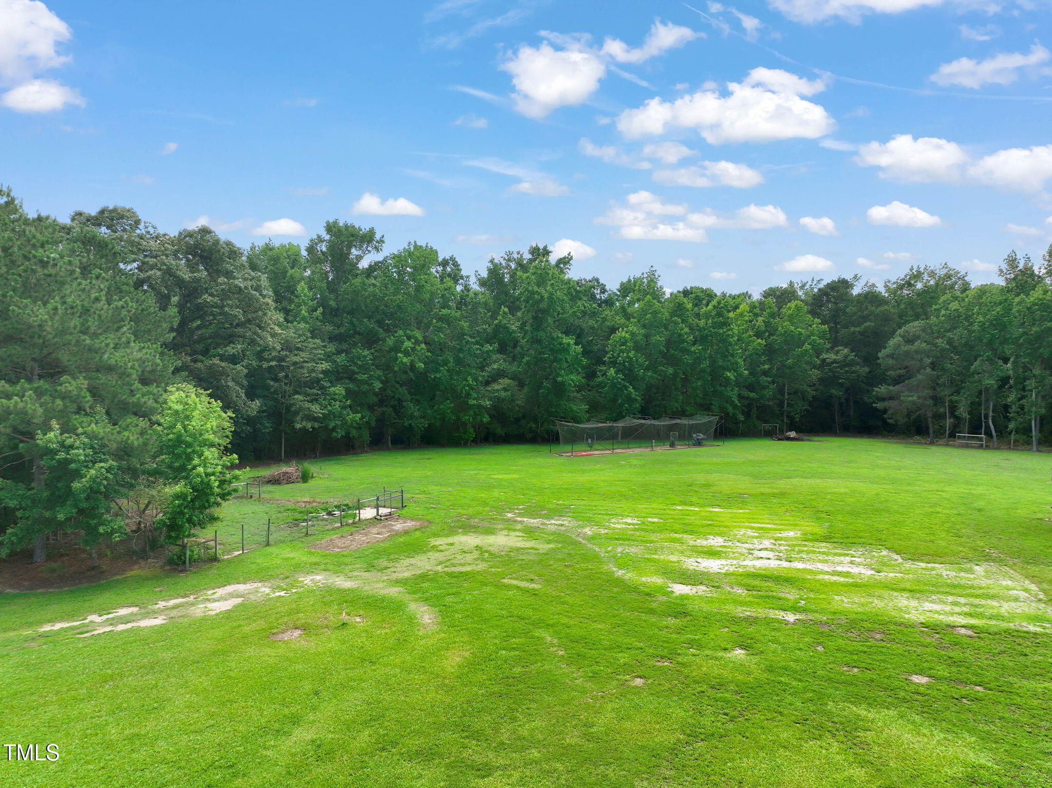 Lot 2 Raleigh Road Four Oaks, NC 27524 - Photo 8 of 12 a backyard of a house with lots of green space