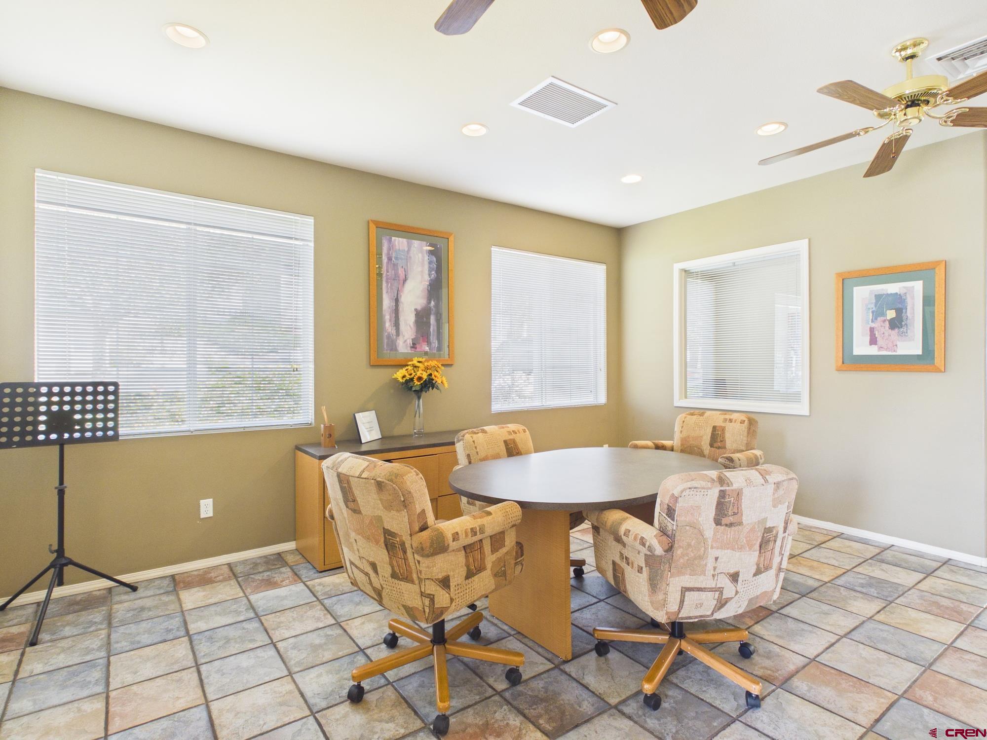 1100 Goeglein Gulch, Unit 216 Durango, CO 81301 - Photo 23 of 25 a bath room with a table and chairs