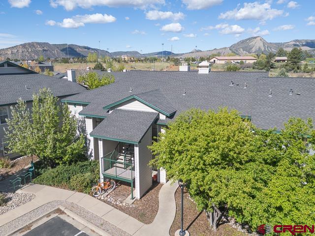 1100 Goeglein Gulch, Unit 216 Durango, CO 81301 - Photo 25 of 25 an aerial view of a house with a yard and outdoor seating
