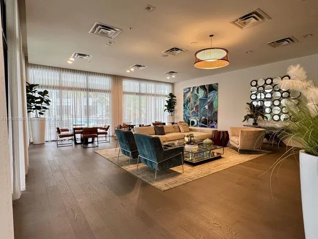 a outdoor space with lots of tables and chairs