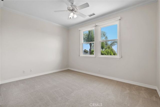 a view of swimming pool with outdoor seating and yard