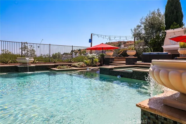 an aerial view of multiple houses with yard