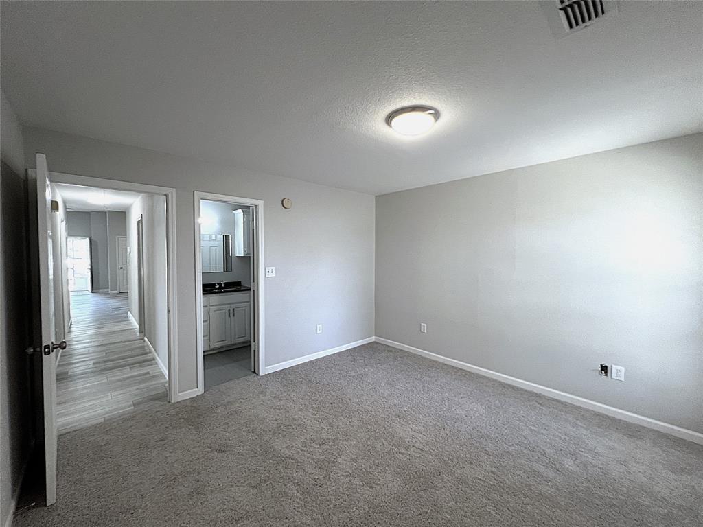 902 Mack Place Denton, TX 76209 - Photo 9 of 11 a view of a hallway