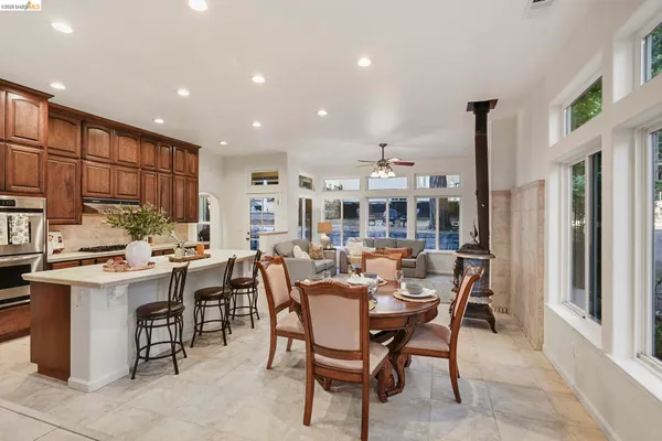 a dining room with a table and chairs
