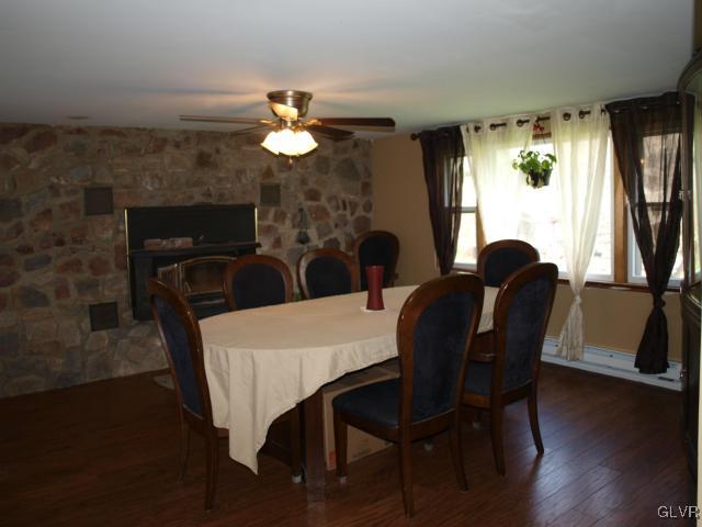 429 Old Grade Road Wind Gap, PA 18091 - Photo 11 of 20 a view of a dining room with furniture and wooden floor