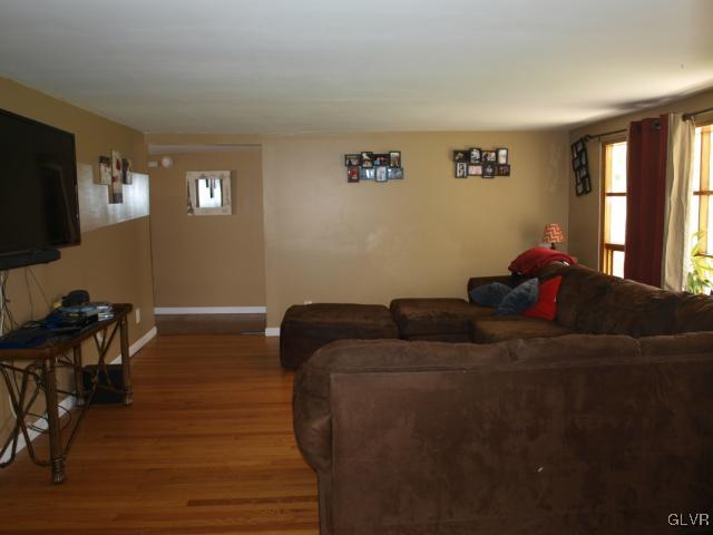 429 Old Grade Road Wind Gap, PA 18091 - Photo 13 of 20 a living room with furniture and a flat screen tv