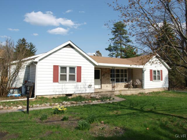 429 Old Grade Road Wind Gap, PA 18091 - Photo 2 of 20 a front view of a house with a yard