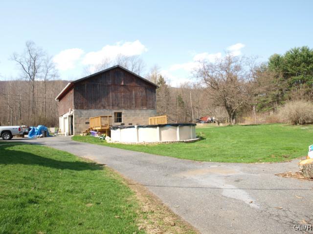 429 Old Grade Road Wind Gap, PA 18091 - Photo 6 of 20 a house view with a garden space