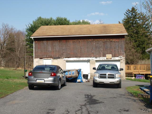 429 Old Grade Road Wind Gap, PA 18091 - Photo 10 of 20 a car parked in front of a house
