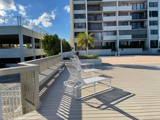 a view of a chairs and tables in the patio
