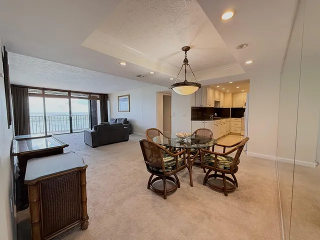 a view of a livingroom and dining room