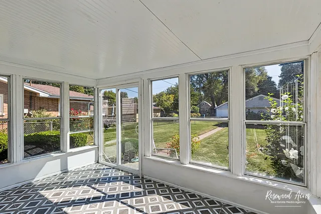 a view of a house next to a yard