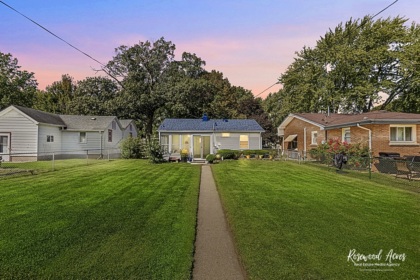 1054 South 7th Avenue Kankakee, IL 60901 - Photo 26 of 30 a front view of a house with a yard