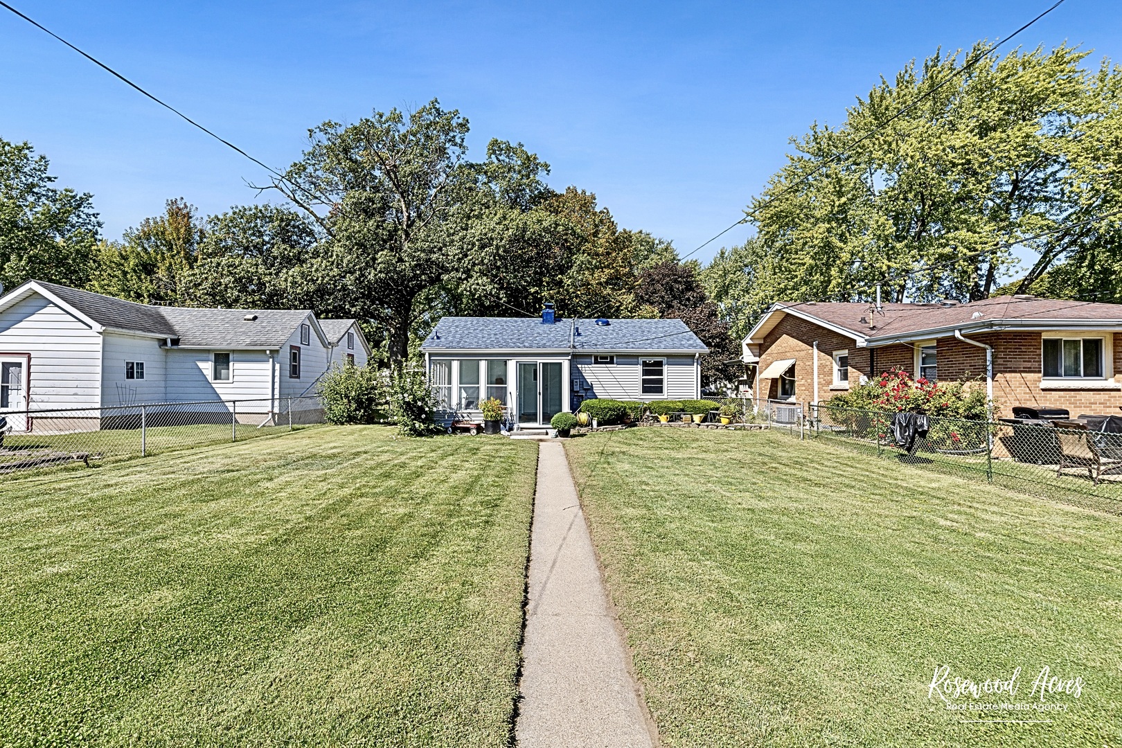 1054 South 7th Avenue Kankakee, IL 60901 - Photo 27 of 30 a front view of a house with a yard