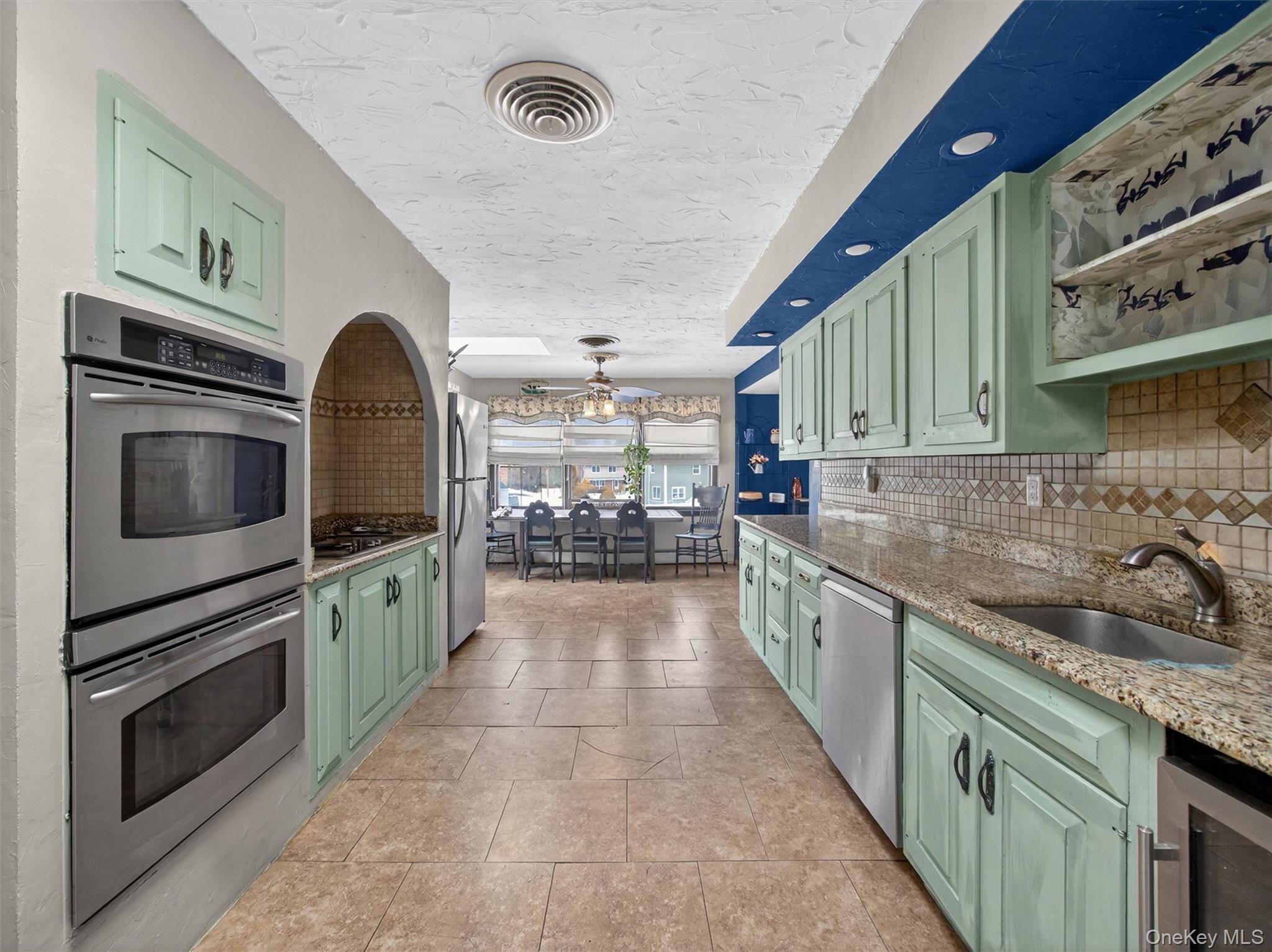 54 Blauvelt Road Blauvelt, NY 10913 - Photo 12 of 41 a large kitchen with stainless steel appliances granite countertop a stove and a sink