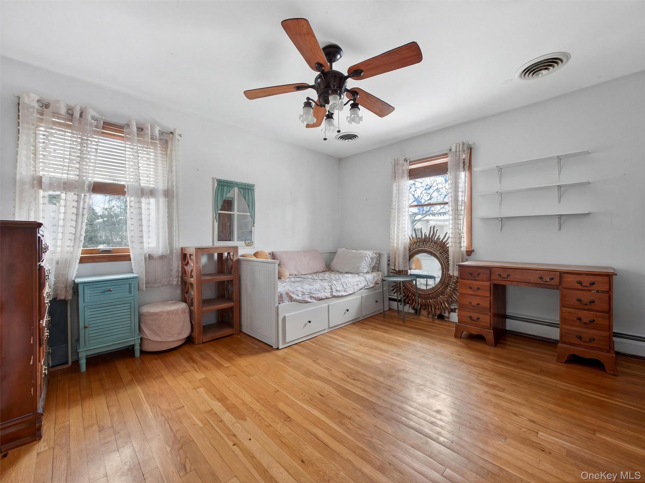 54 Blauvelt Road Blauvelt, NY 10913 - Photo 23 of 41 a living room with furniture and a wooden floor