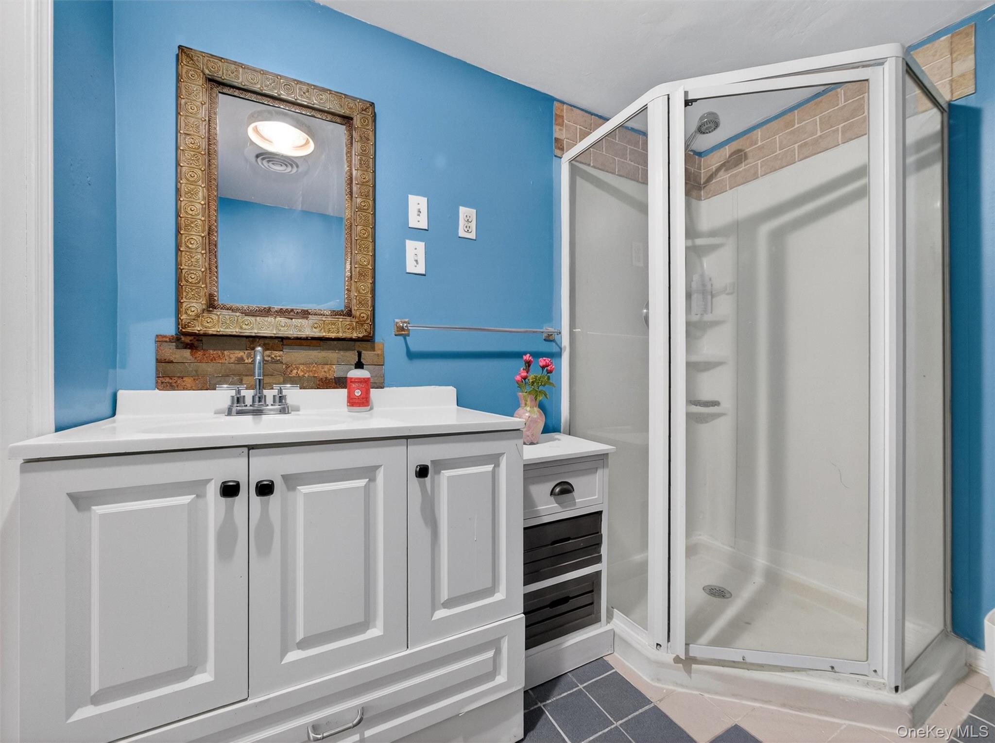 54 Blauvelt Road Blauvelt, NY 10913 - Photo 33 of 41 a bathroom with a granite countertop sink and a mirror