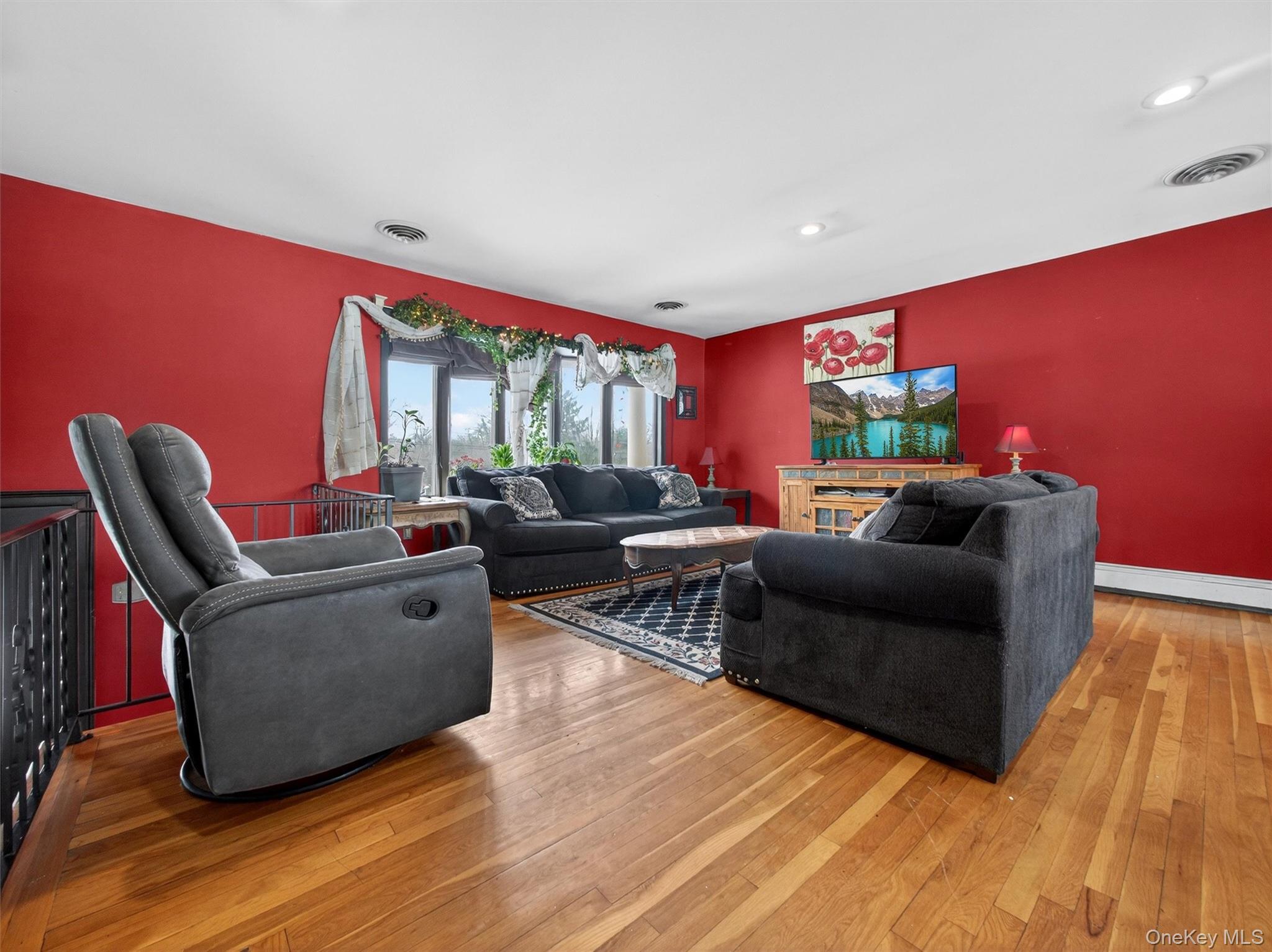 54 Blauvelt Road Blauvelt, NY 10913 - Photo 5 of 41 a living room with furniture and a wooden floor