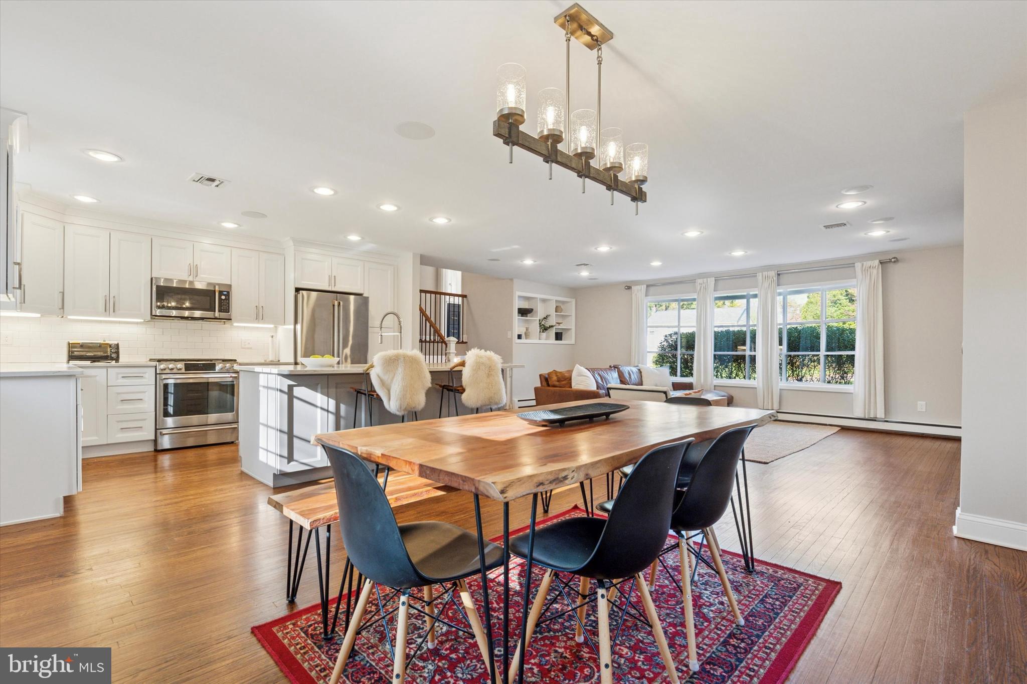 913 Penn Valley Road Media, PA 19063 - Photo 11 of 34 a large kitchen with a table and chairs
