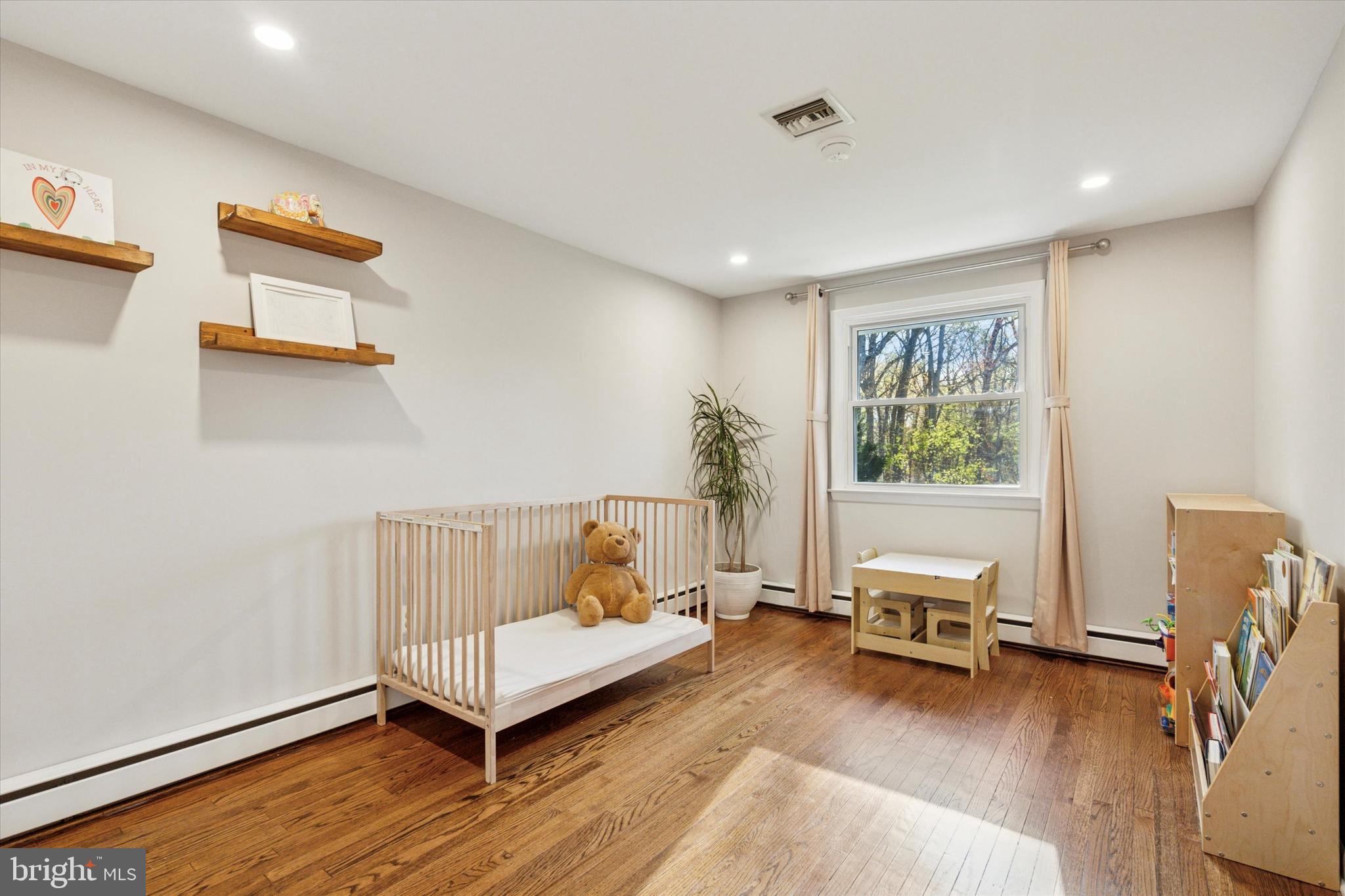 913 Penn Valley Road Media, PA 19063 - Photo 21 of 34 a living room with furniture and a table