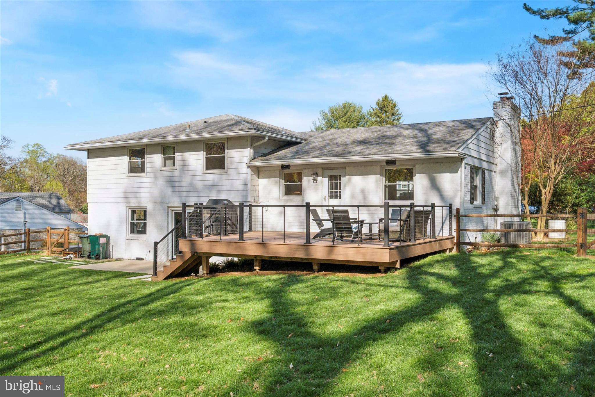 913 Penn Valley Road Media, PA 19063 - Photo 30 of 34 a front view of a house with a yard table and chairs