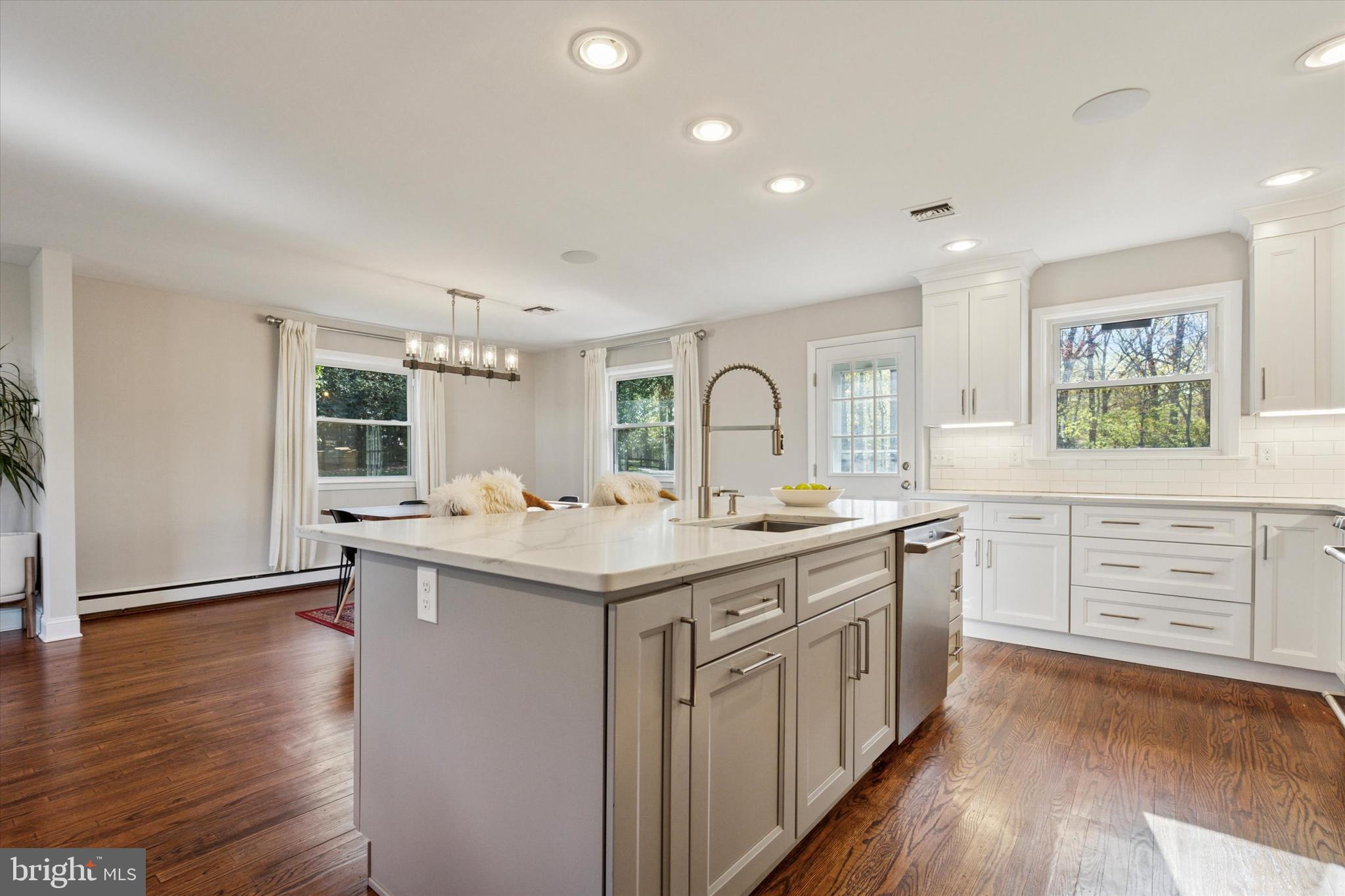 913 Penn Valley Road Media, PA 19063 - Photo 3 of 34 a kitchen with sink stove and wooden floor