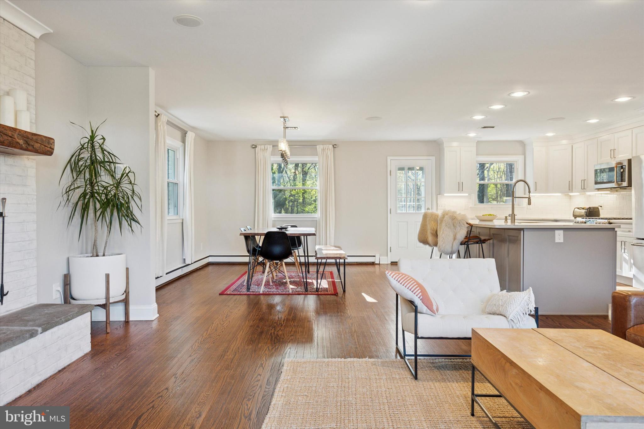 913 Penn Valley Road Media, PA 19063 - Photo 8 of 34 a living room with furniture and a large window